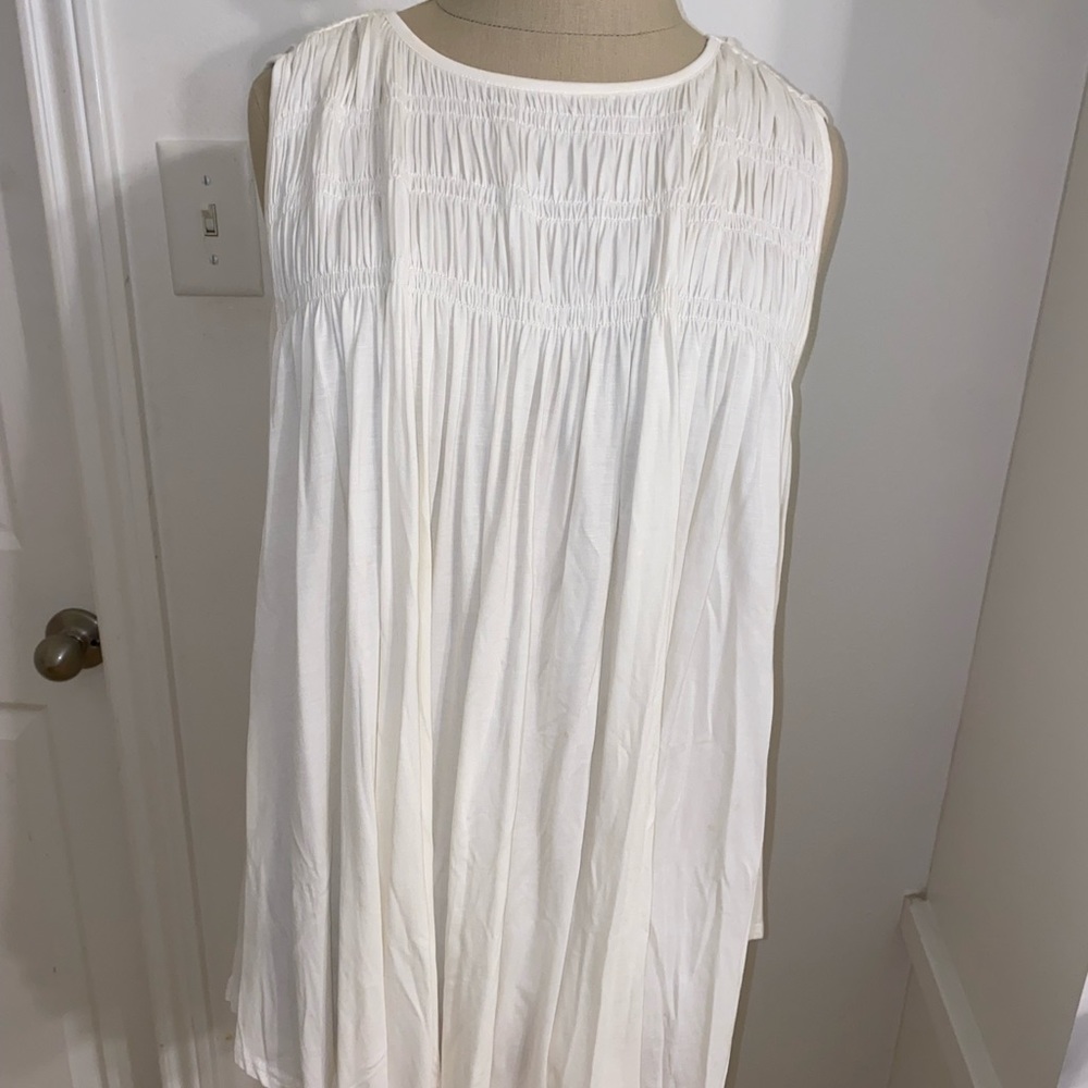 Flowy white sleeveless cotton tee